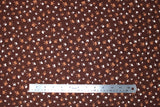 Flat swatch animal themed printed fabric in Paws on Brown
