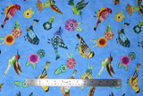 Flat swatch animal themed printed fabric in Floral Flight Blue