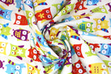 Swirled swatch animal themed printed fabric in Petite Elin (multicoloured owls)