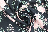 Swirled swatch flower & plant print fabric in bliss (rose print on black)