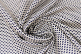 Swirled swatch chain fabric (white fabric with small black diamonds arranged to look like chain pattern)