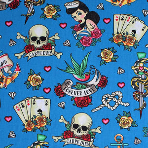 Square swatch Forever Love Sailor fabric (blue fabric with tossed american traditional tattoo style doodles allover: pinup sailor girl, 4 of a kind hand in aces, roses, skulls, swallow birds, snakes and daggers, anchors, etc.)