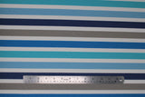 Flat swatch sapphire stripe fabric (teal, light blue, dark blue, grey, blue striped fabric with smaller white stripes in between each colour)