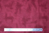 Flat swatch near solid print fabric in maroon