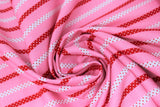 Swirled swatch pink stripes fabric (pink fabric with alternating white and red thin stripes with opposite colour tiny polka dots within)
