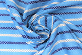 Swirled swatch blue stripes fabric (medium blue fabric with alternating white and navy thin stripes with opposite colour tiny polka dots within)