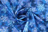 Swirled swatch Blue fabric (dark blue fabric with various shades of blue realistic look snowflakes collaged allover with silver sparkles)