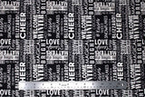 Flat swatch winter printed fabric in Text on Black (winter words)