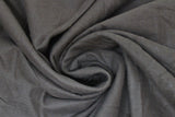 Swirled swatch black flannel fabric