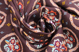 Swirled swatch Bouquet in Circle on Brown print fabric