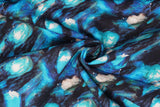 Print "Star Dust" from the Spirit Winds collection, twisted to show drape and texture.