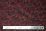 Flat swatch small faded stars printed fabric in burgundy