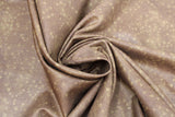Swirled swatch small faded stars printed fabric in brown