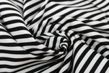 Swirled swatch stripe printed fabric in Black & White Stripes