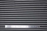 Flat swatch black and grey fabric (medium thickness horizontal stripes in black and light grey alternating)
