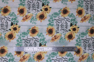 Group swatch assorted sunflower themed fabrics in various styles/colours