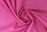 Swirled swatch swiss dot printed fabric in pink