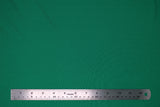 Flat swatch emerald green spandex fabric