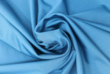 Swirled swatch teal spandex fabric