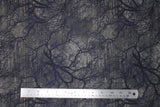 Flat swatch twilight fabric (light to dark grey marbled look fabric with large black and dark purple spooky trees/branches and thin stripes/trunks behind)