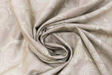 Swirled swatch brown stump fabric (pale brown fabric with circular cut log ends design allover)