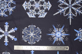 Flat swatch Christmas printed fabric in Snowflakes on Navy