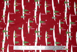 Flat swatch Christmas printed fabric in Snowy Trees on Red