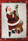 Full swatch Christmas printed fabric in Santa Filling Stockings (panel)