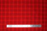 Flat swatch yuletide themed printed fabric in Red Plaid