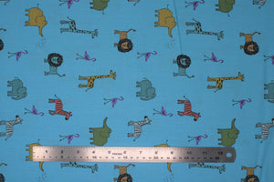Group swatch zoo animals themed fabrics in various shades of blue